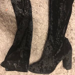 Thigh high black suede boots